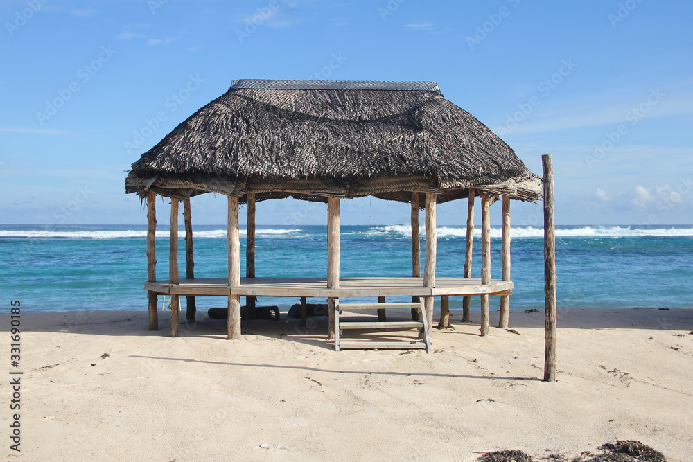 Beach fale, a simple open 'hut' (faleo'o Samoan language), popular in budget eco-tourism in Samoa. Beautiful day fale at Lalomanu Beach