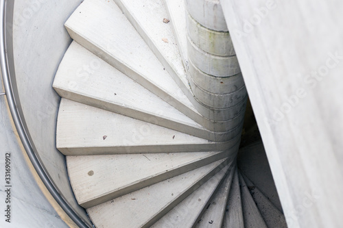 Spiral concrete staircase on the street in the city
