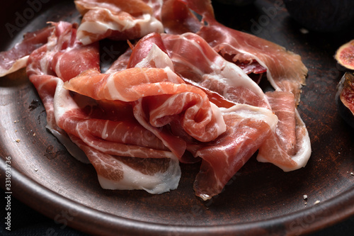 Delicious jamon on the table for appetizers and dinner.