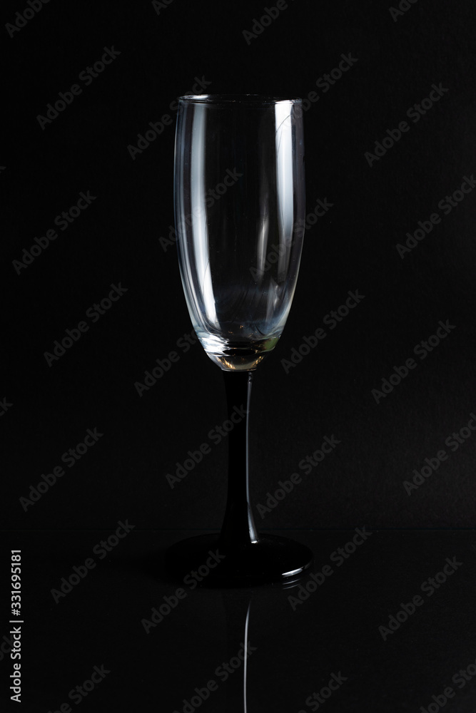 Empty glass on a black background