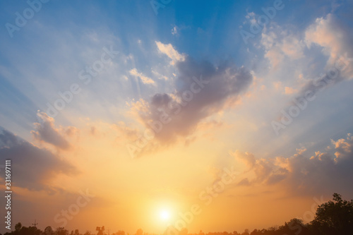 Bright orange sky and light of the sun. © Aphisith