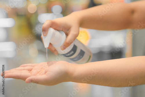 washing hands with alcohol gel concept. prevent the spread of germs and bacteria and avoid infections corona virus, Covid19 , High Res
