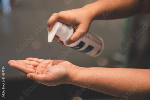 washing hands with alcohol gel concept. prevent the spread of germs and bacteria and avoid infections corona virus, Covid19 , High Res