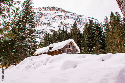 hut with snow on the dolomites © Alvise