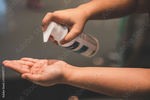 washing hands with alcohol gel concept. prevent the spread of germs and bacteria and avoid infections corona virus, Covid19 , High Res