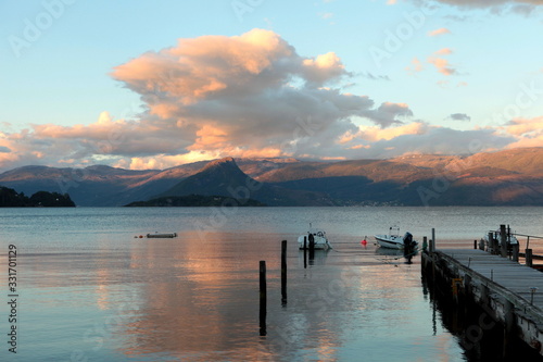 Sunset pink sky and beautiful view of the Norwegian fjord Sognefjorden, Norway