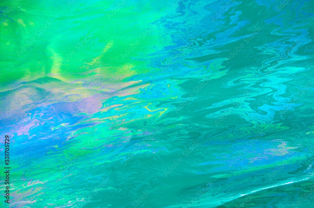 The color texture of motor oil on the water 