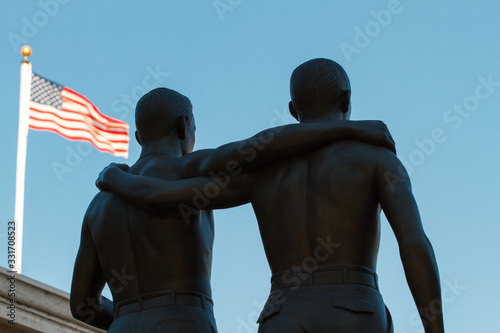 the statue of two soldiers inside the war cemetery of Nettuno, near Rome, relating to the Second World War