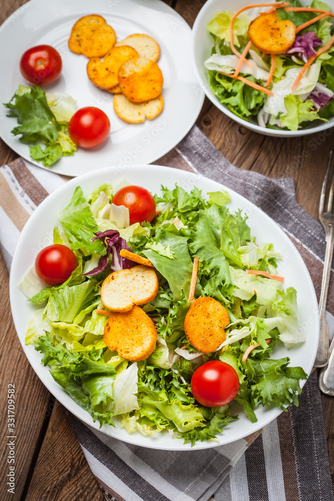 Mixed salad with croutons. Mixed salad with croutons.