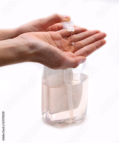 antibacterial gel for disinfection of the hands of the young gir