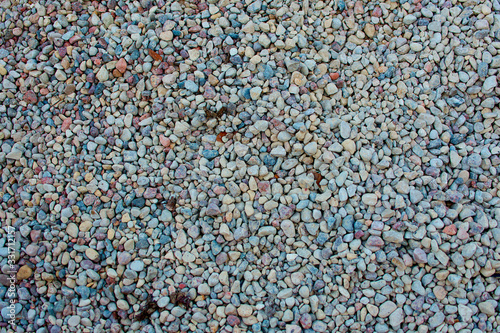 Stone texture background. Crushed gravel as background or texture. Granite gravel. Granite crumb close-up. Bbackground. Texture. Brown. Structure.