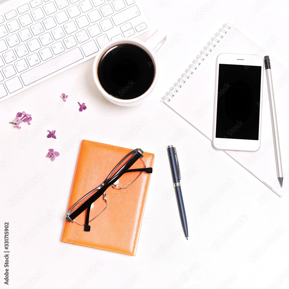 Work place computer keyboard mobile phone coffee notebook glasses lilac Work place computer keyboard mobile phone coffee notebook glasses lilac
