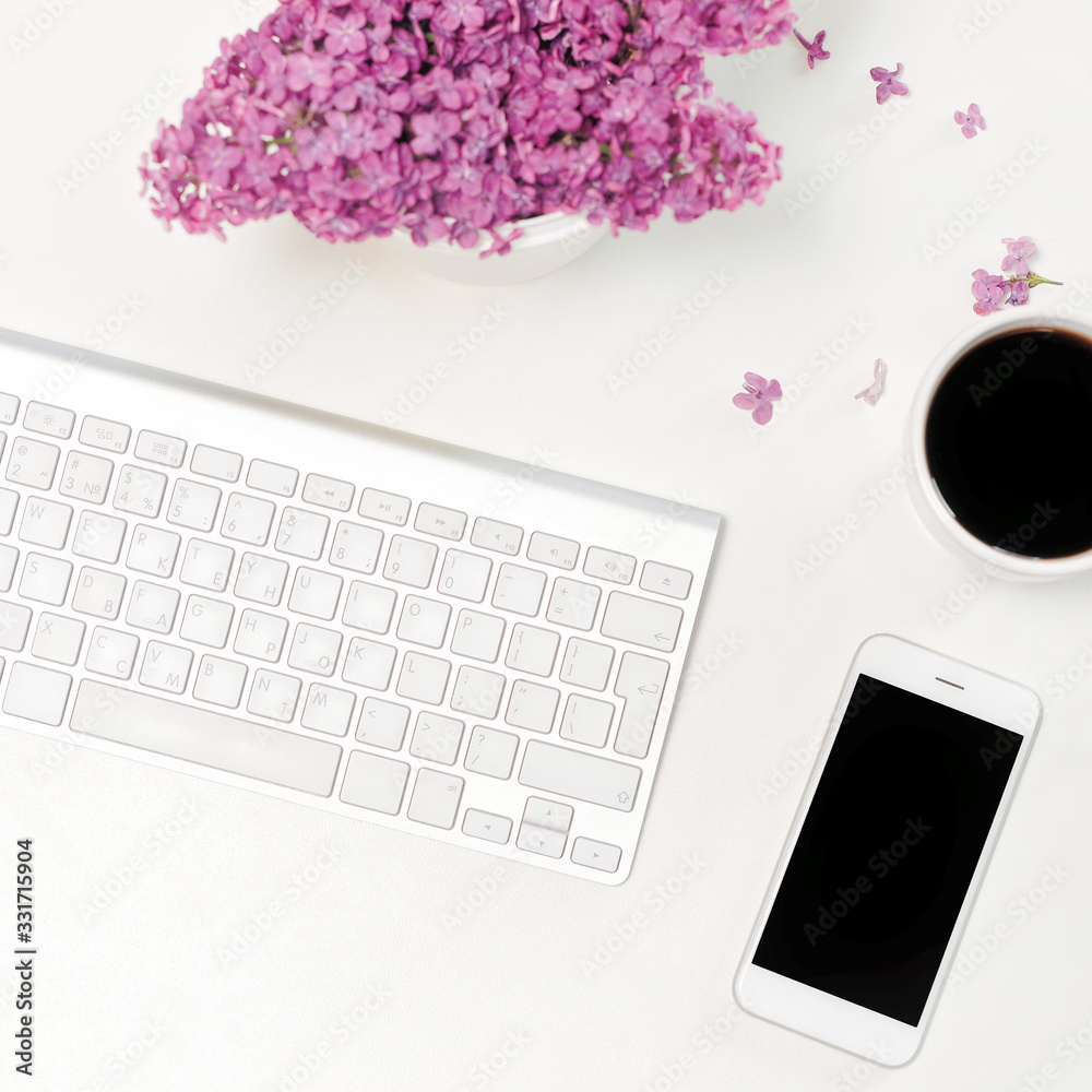 Work place computer keyboard mobile phone coffee glasses lilac Work place computer keyboard mobile phone coffee glasses lilac