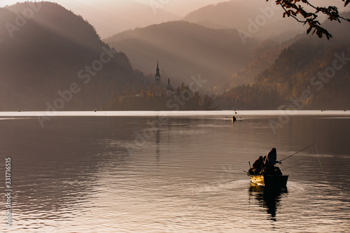 Afternoon lights at Bled Lake, Slovenia, Europe. St. Martin church in the background.