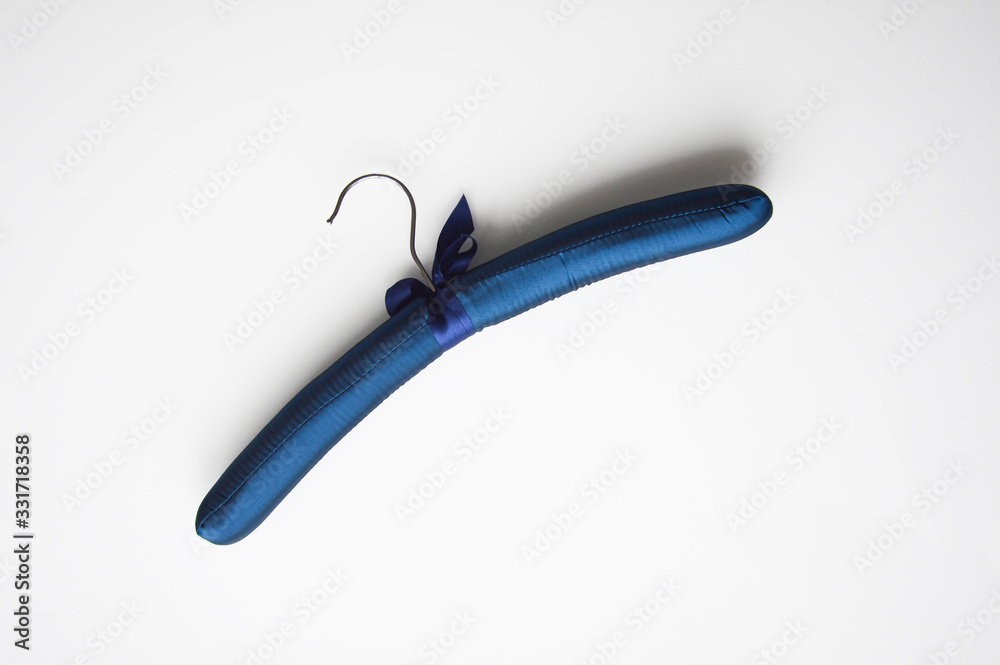 Blue clothes hanger with hook. Blue clothes hanger with hook.