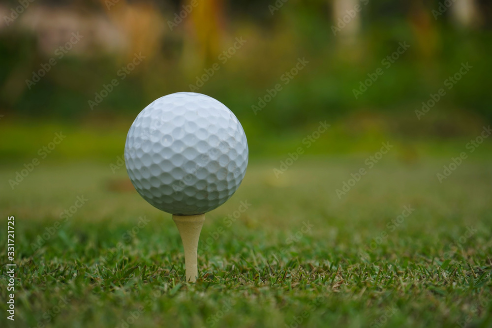Golf ball on tee ready to be shot. Golf ball on tee ready to be shot.