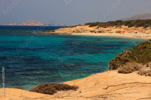 Fototapeta Naklejka Na Ścianę i Meble -  Alyko beach, Naxos / Greece - August 24, 2014: Alyko beach view in Naxos, Cyclades Islands, Greece