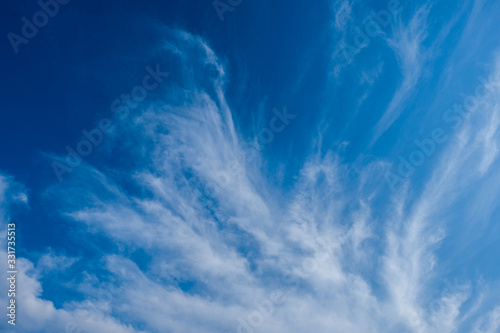 blue sky horizontal with beautiful puffy fluffy clouds with sunlight  abstract nature background