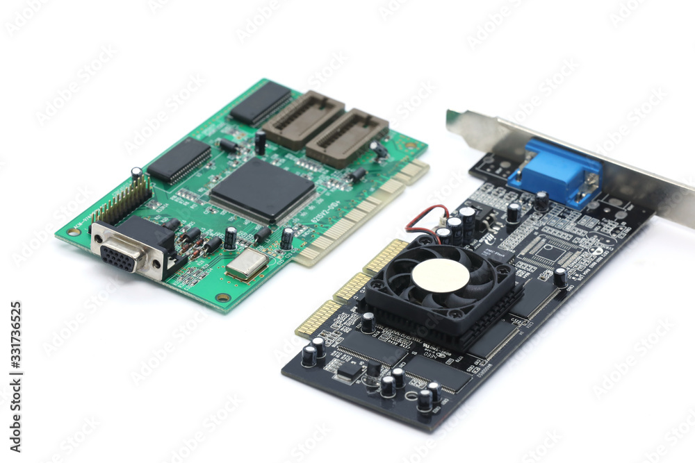 computer chip and old video card isolated on a white background computer chip and old video card isolated on a white background