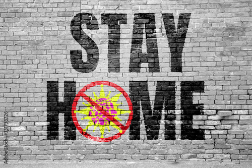 Fotografie Stay Home and Stop the Virus Graffitti