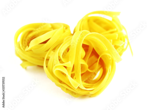 Golden round macaroni on a white background