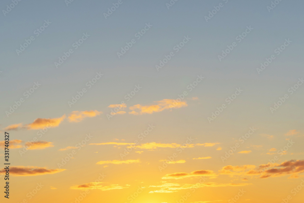 Beautiful clear, morning sky at sunrise, natural background. Soft gradient from orange to blue. Описание (на английском языке)95