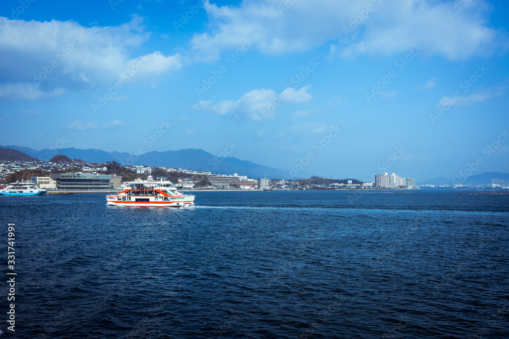 Miyajima, Japan - January 02, 2020: Ferry Boat to Itsukushima Shrine