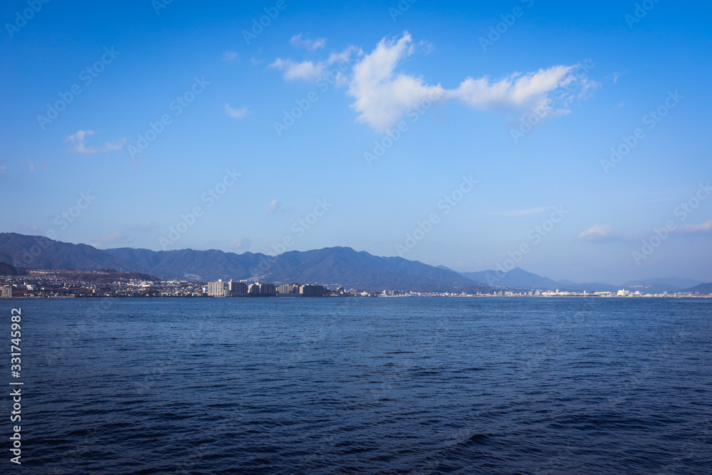 Naklejka premium Miyajima, Japan - January 02, 2020: Ferry Boat to Itsukushima Shrine