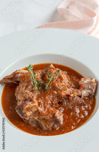 Lamb stew with aromatic herbs seen from above