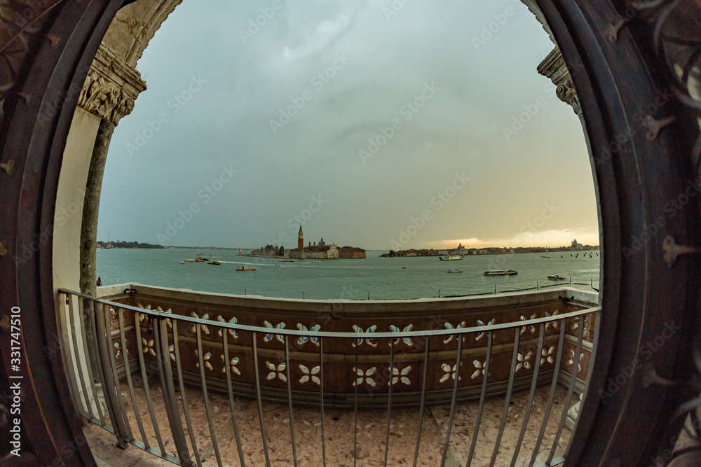 VENICE, ITALY - August 02, 2019: Interior of Doge`s Palace - Palazzo Ducale. Grand Canal View. Doge`s Palace is one of the main tourist attractions in Venice. Visitors walk inside the Museum