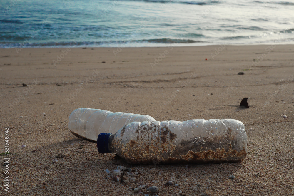 2 plastic bottle on the beach 2 plastic bottle on the beach