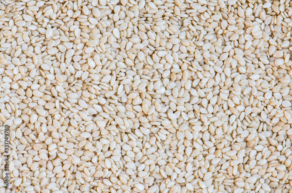 Close-up sesame texture. Natural food background. Close-up sesame texture. Natural food background.