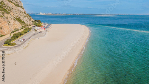 Beautiful beaches with transparent waters in Arrábida, in Setúbal, Portugal. Figueirinha beach photo
