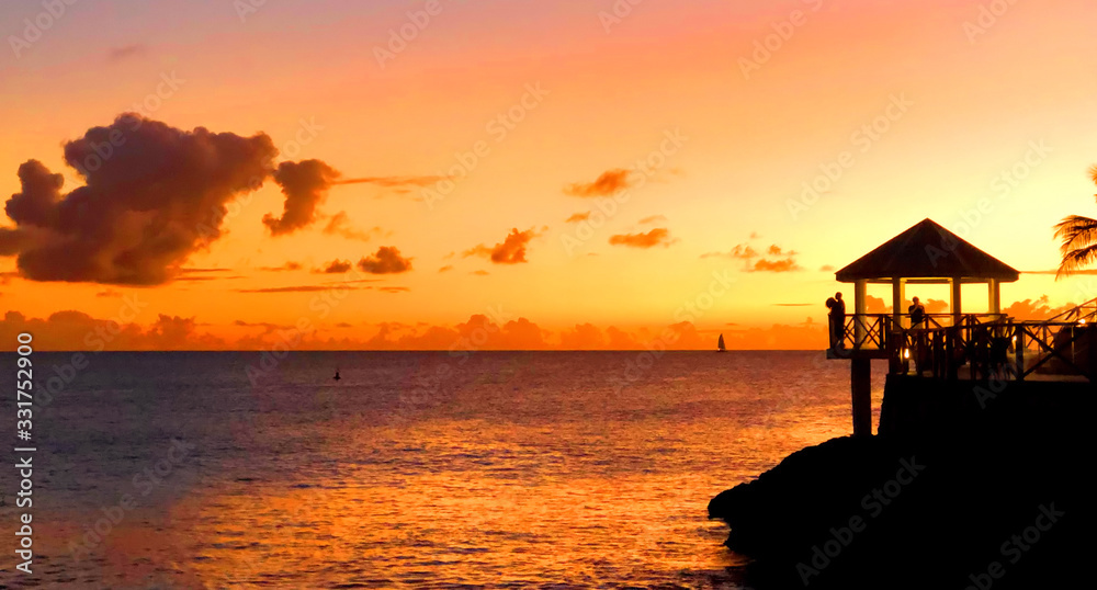 Sunset from Maho Beach on the Caribbean Island of Sint Maarten Sunset from Maho Beach on the Caribbean Island of Sint Maarten