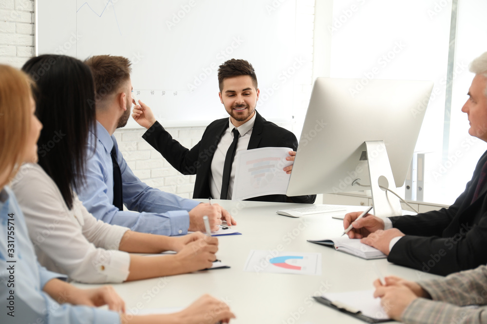 Professional business trainer working with people in office Professional business trainer working with people in office