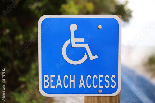 Blue Disabled Beach Access Sign at Public Ocean Access Path