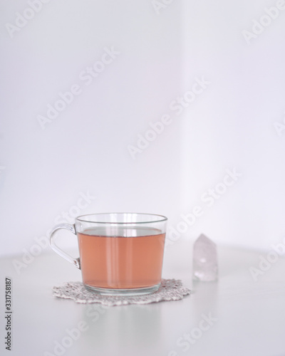 tea with crystal on doily