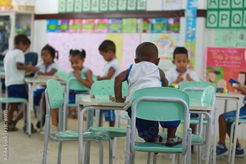 children in public school classroom