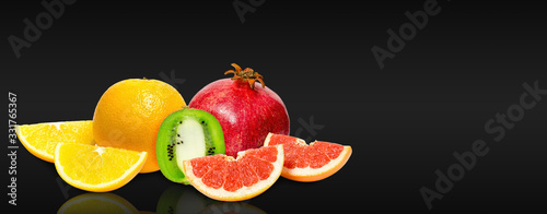 Fototapeta Naklejka Na Ścianę i Meble -  Fresh and ripe fruits, orange, kiwi, grapefruit and pomegranate.