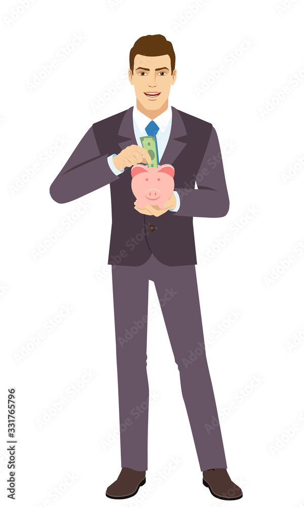 Smiling Businessman puts banknote in a piggy bank. Full length portrait of Businessman in a flat style. Smiling Businessman puts banknote in a piggy bank. Full length portrait of Businessman in a flat style.