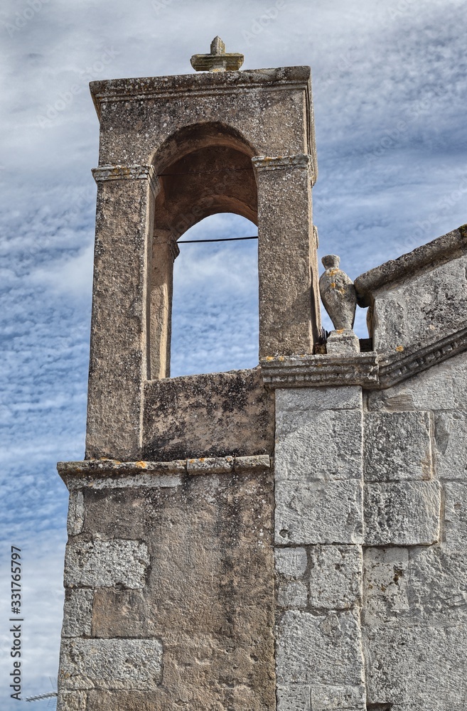Bell tower of the Church of Santa Croce, Cossoine. Sardinia, Italy