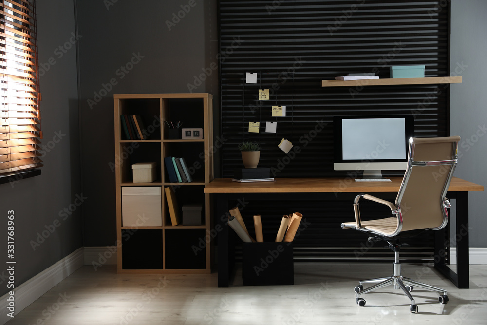 Comfortable workplace with computer and office chair. Stylish room interior Comfortable workplace with computer and office chair. Stylish room interior