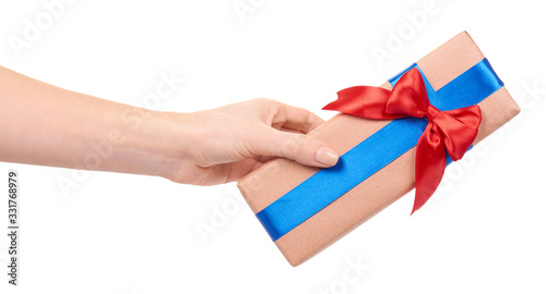 Gift box wrapped with brown paper. Isolated.