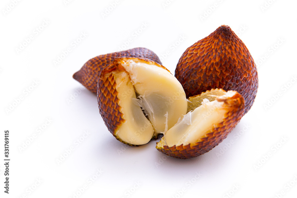 salacca or spiny palm fruit that has been peeled and intact, isolated white background and copy space, scientific name: Salacca zalacca salacca or spiny palm fruit that has been peeled and intact, isolated white background and copy space, scientific name: Salacca zalacca