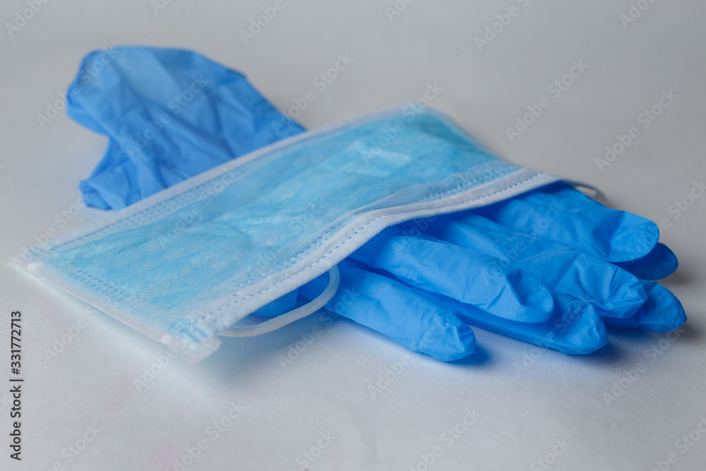 protective mask and rubber gloves. Suitable for demonstrating personal protective equipment during the period of viruses protective mask and rubber gloves. Suitable for demonstrating personal protective equipment during the period of viruses