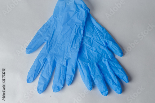protective mask and rubber gloves. Suitable for demonstrating personal protective equipment during the period of viruses © Losev Ivan