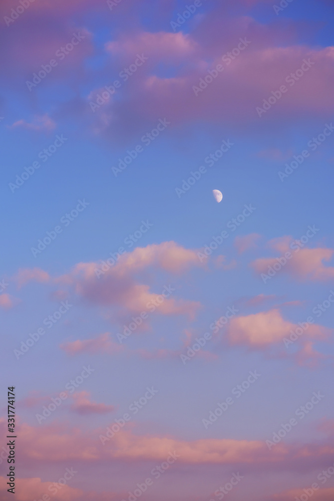 Evening sky with clouds and moon. Golden hours sky Evening sky with clouds and moon. Golden hours sky