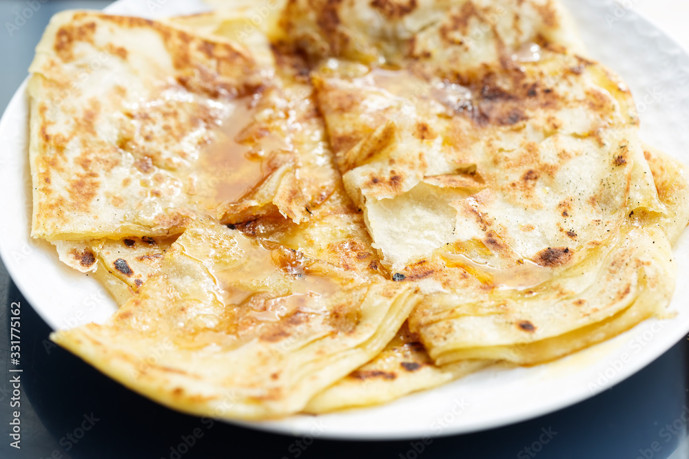 Sweet msemen - Moroccan pancakes with honey 