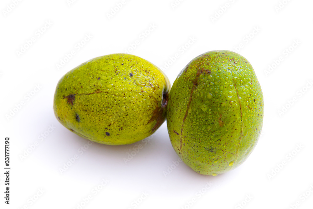 fresh green amberella fruit, isolated on a white background and copyspace, scientific name: Spondias dulcis fresh green amberella fruit, isolated on a white background and copyspace, scientific name: Spondias dulcis