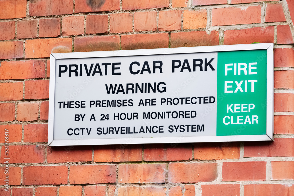 Private parking sign at hotel car park